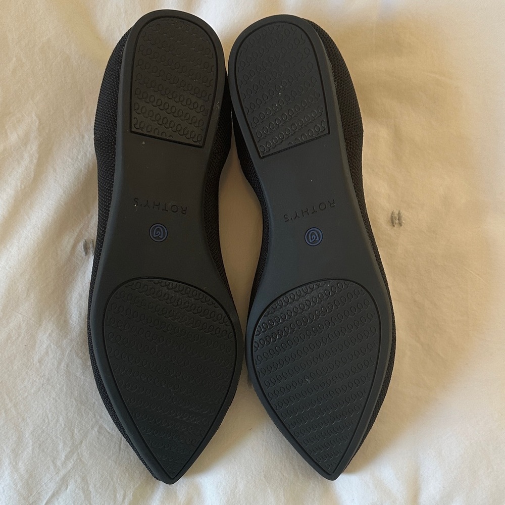 Rothy's Elegant Black Flats with Vibrant Blue Accent - Picture 3 of 6